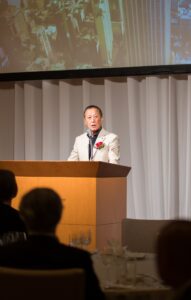 演説中の代表取締役社長 岩本 守